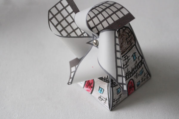  make a small 3D windmill. Print out as many as you like to decorate
