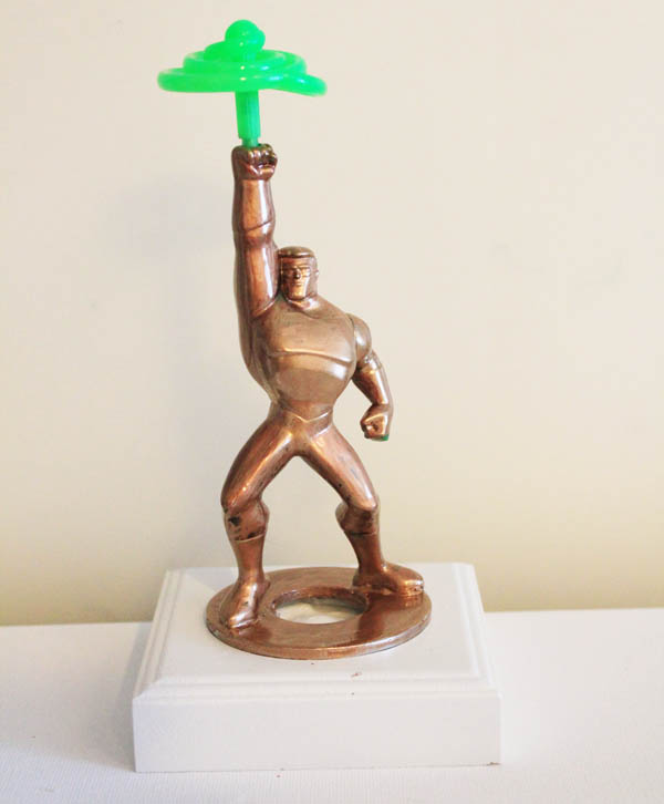 make a trophy from a child's toy