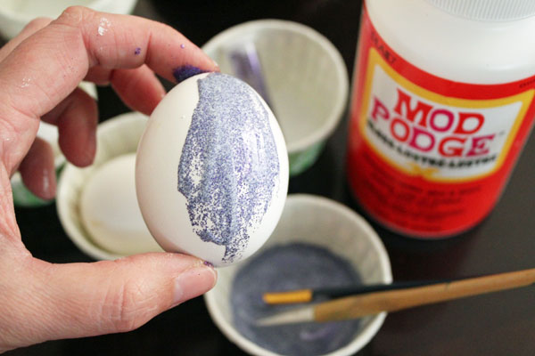paint glitter mod podge onto eggs