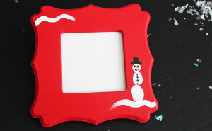 Thumbprint Snowman Frame at 30 Minute Crafts