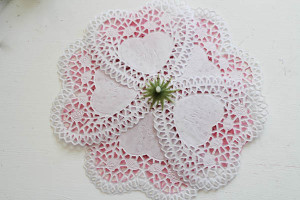 put the white doilies and green stem back on