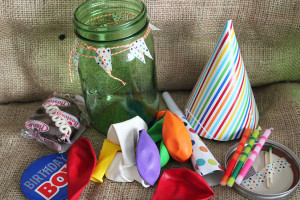 birthday party supplies tucked into a mason jar
