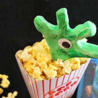 creepy hand in the popcorn