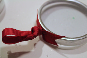 glue ribbon to lid