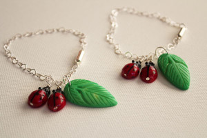 two ladybug bracelets