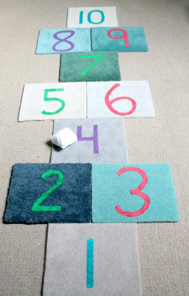 hopscotch-squares-with-carpet-tiles-and-a-beanbag-652x1024