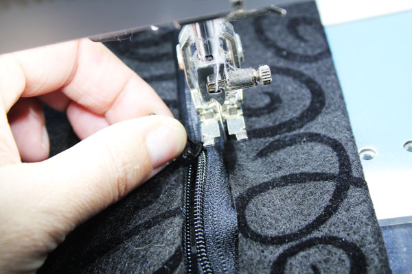 to move the zipper lift the presser foot